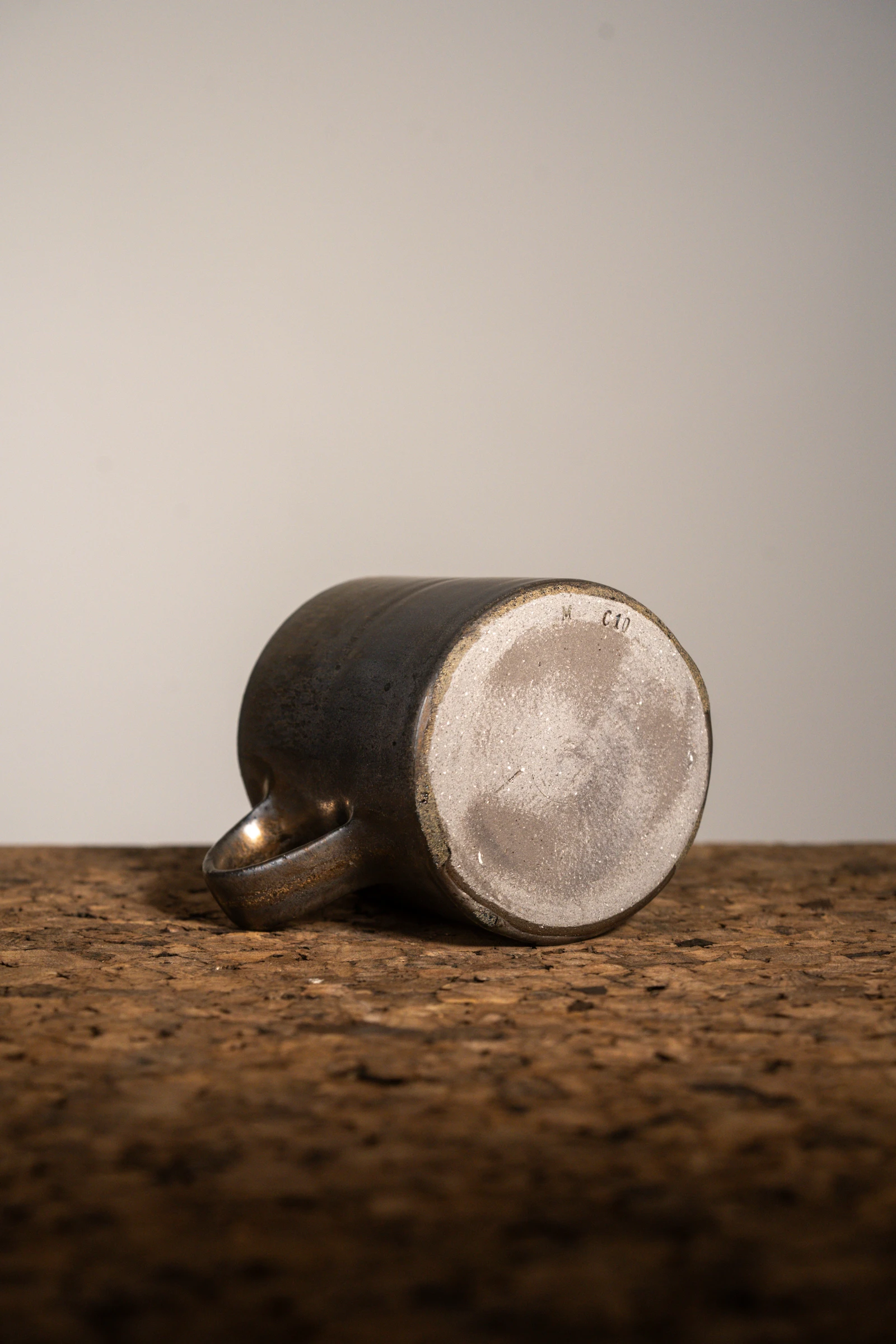 Bronze Mug C10 — stoneware handled mug in bronze glaze, photograph 3 of 5