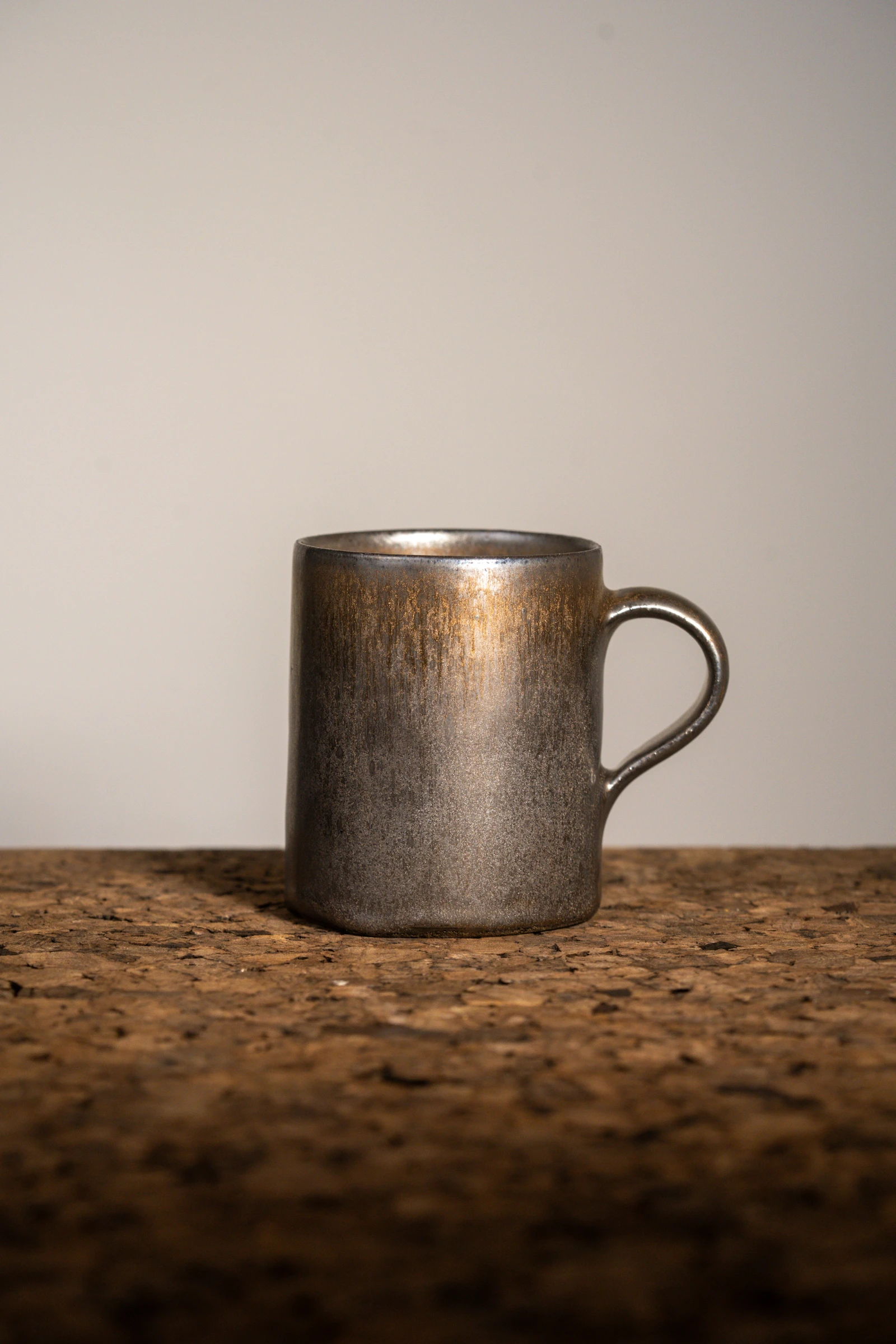 Bronze Mug C04 — stoneware handled mug in bronze glaze, photograph 1 of 4