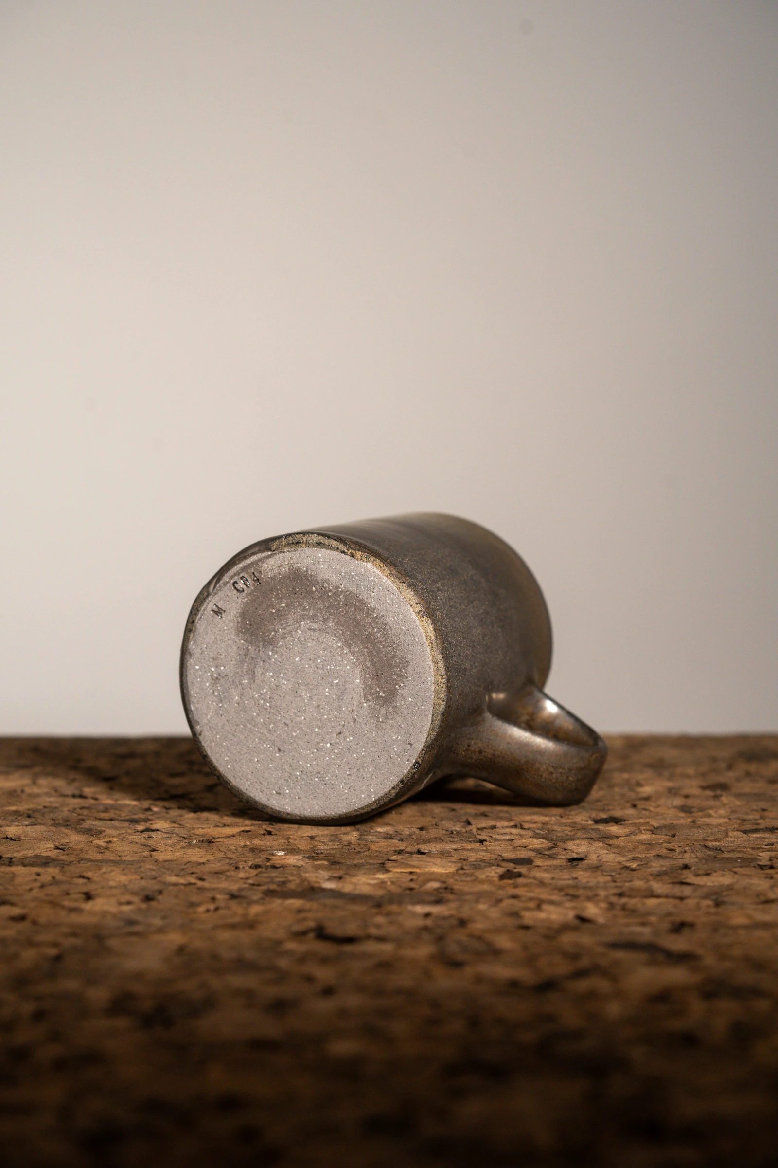 Bronze Mug C04 — stoneware handled mug in bronze glaze, photograph 3 of 4
